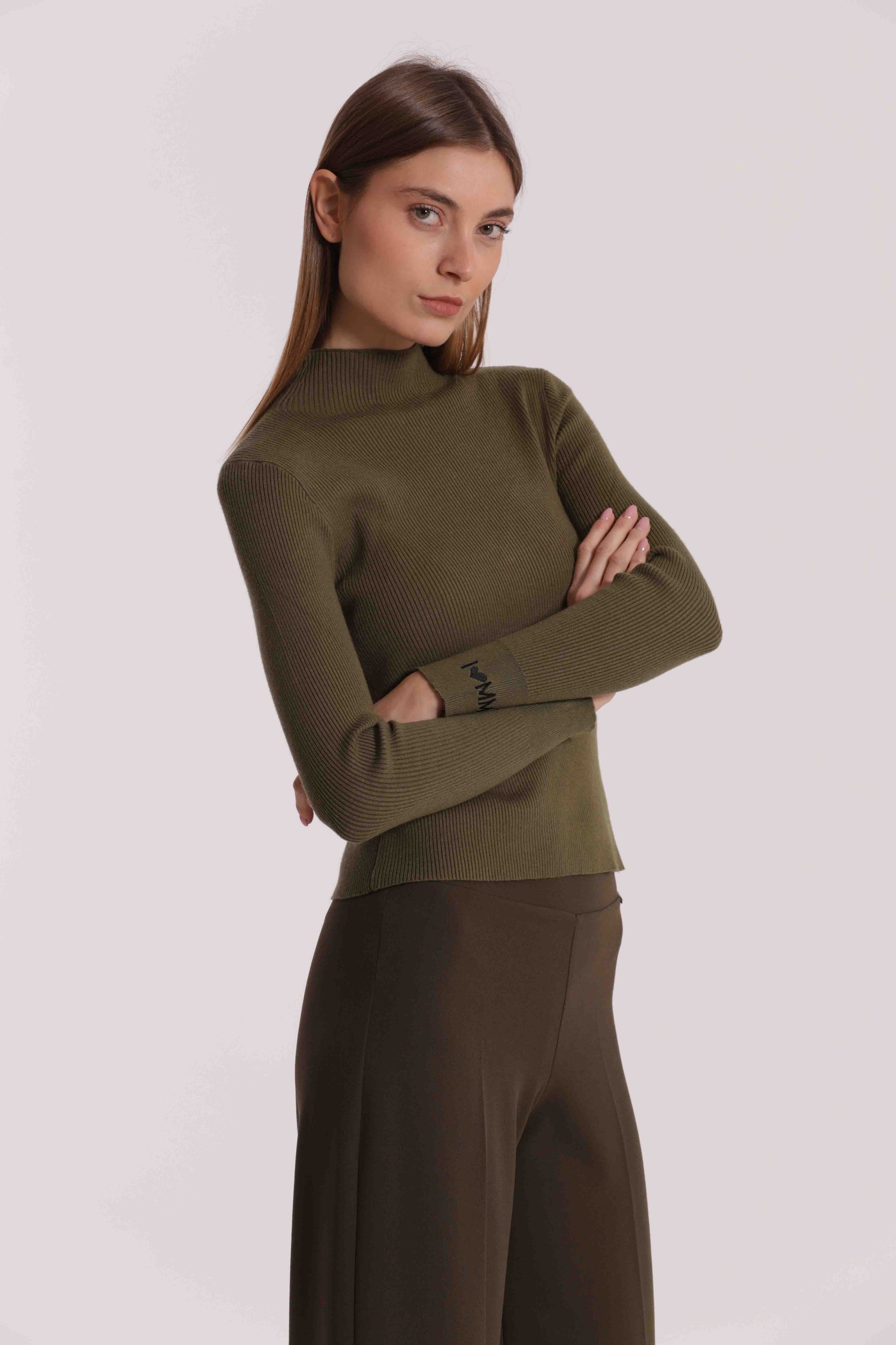 MAGLIA CON LOGO SUL POLSO
