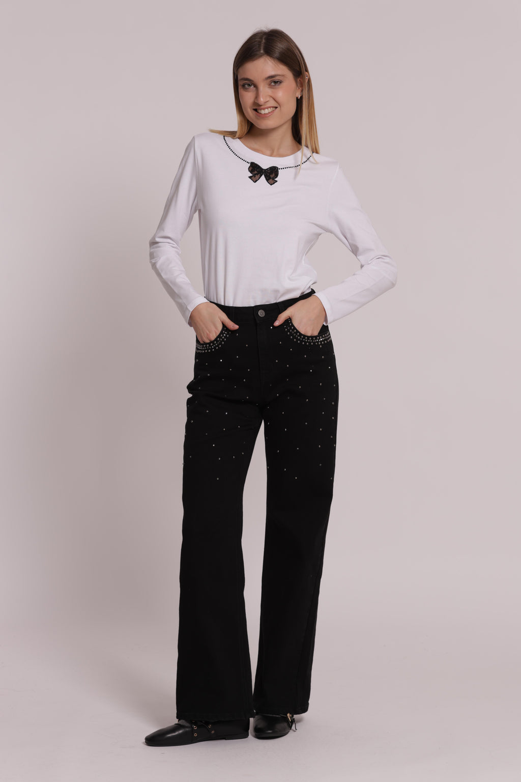 JEANS WIDE LEG CON BORCHIE E STRASS