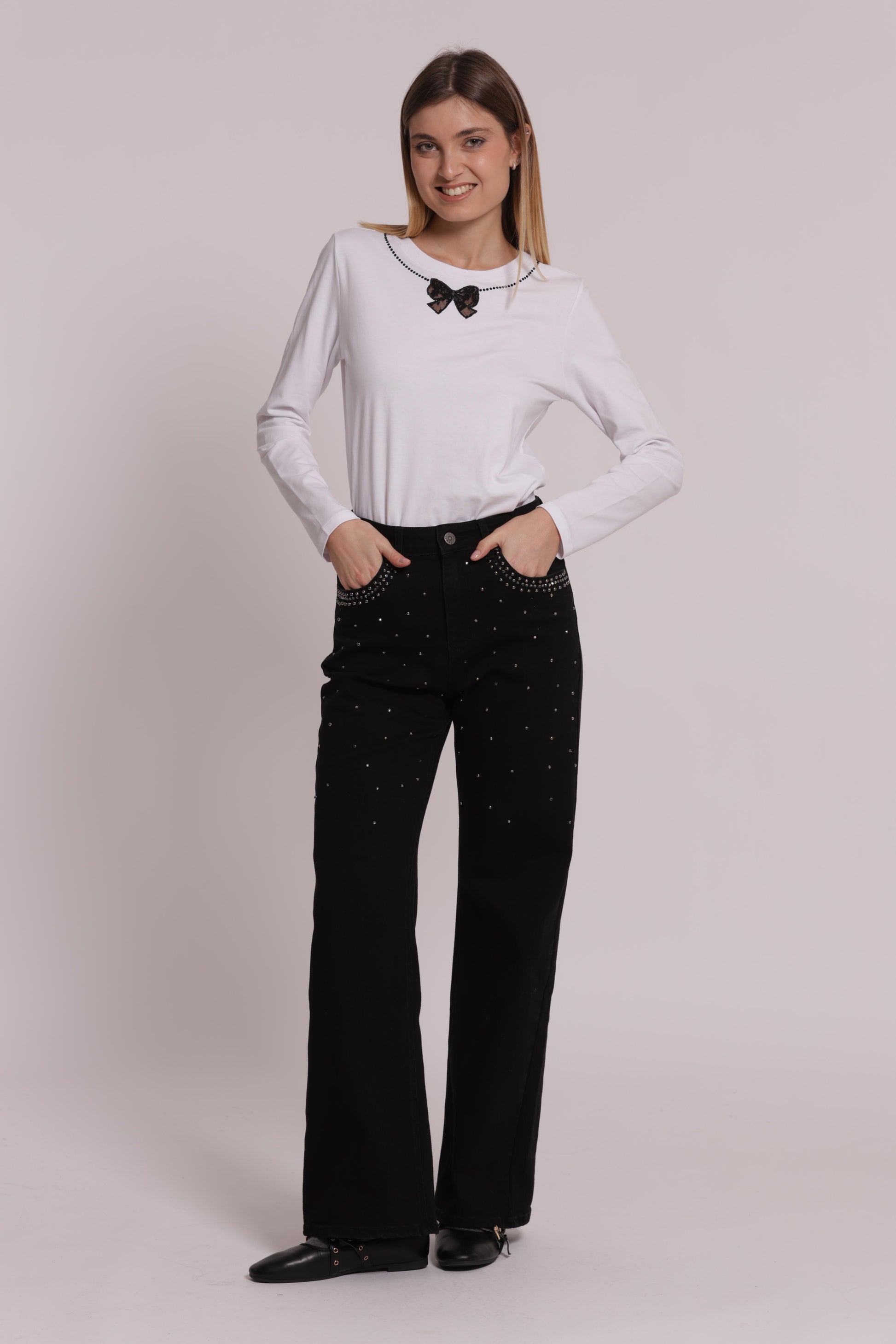 JEANS WIDE LEG CON BORCHIE E STRASS