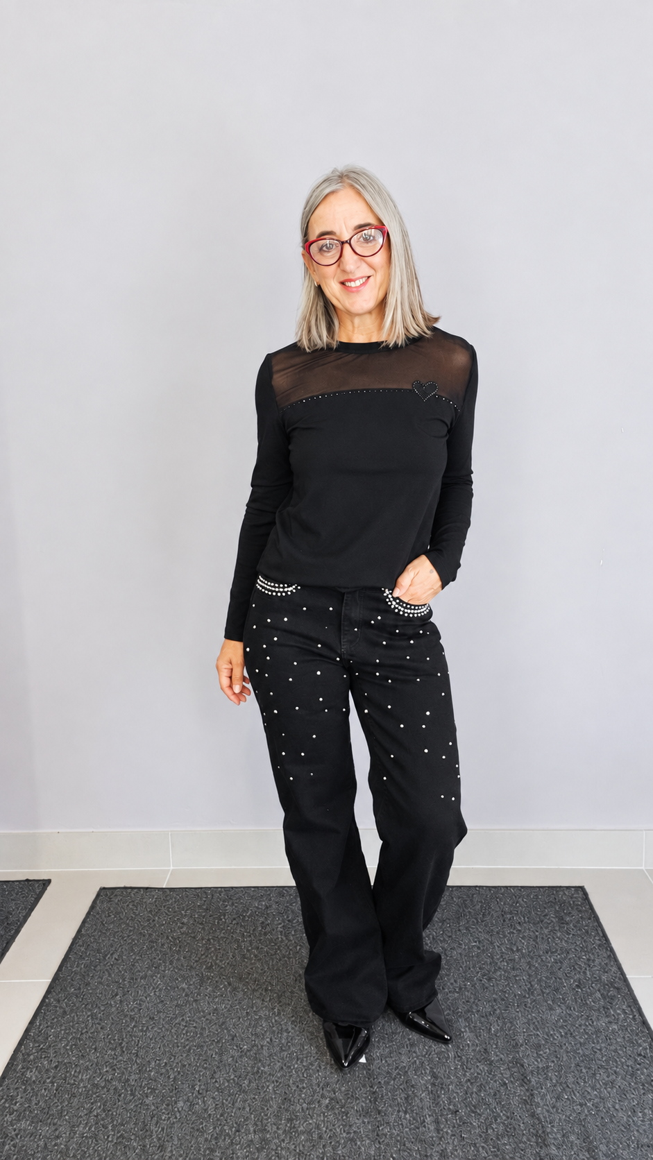 JEANS WIDE LEG CON BORCHIE E STRASS